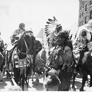 Cover image of Hector Crawler (Wachegiye) (Prayer Giver) on horse (left), George McLean (Tatâga Mânî) (Walking Buffalo)